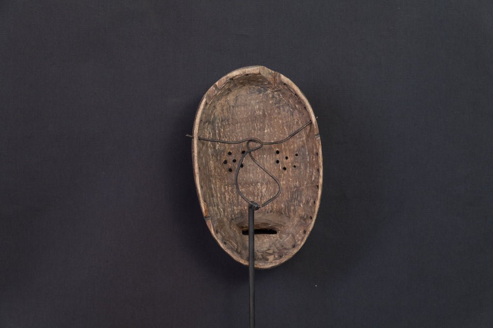 Masque Igbo initiatique circulaire aux cornes recourbées -