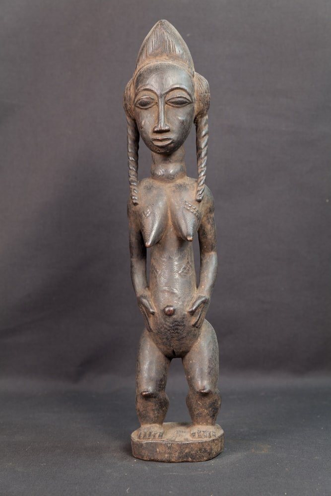 Statue Baoulé féminine à la coiffure torsadée -