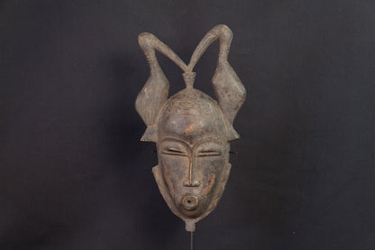 Masque Baoulé à coiffe double d’antilope et bouche tubulaire - 