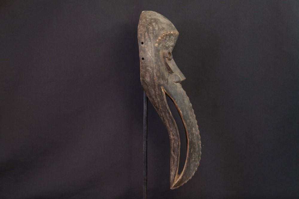 Masque Dan à bec d'oiseau allongé et yeux en amande - 