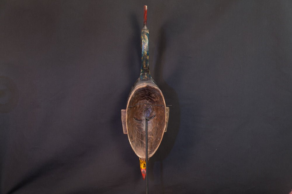 Masque Gouro à coiffe d’oiseau et motifs colorés - 