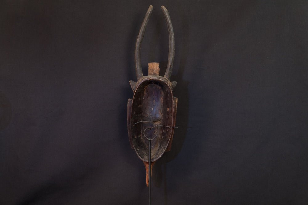 Masque Gouro en bois à coiffe verticale et cornes - 