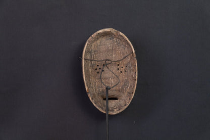 Masque Igbo initiatique circulaire aux cornes recourbées - 